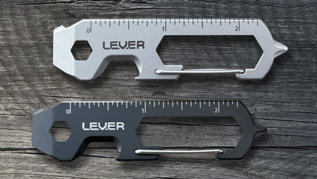 Black and Silver Clip KT on wood background